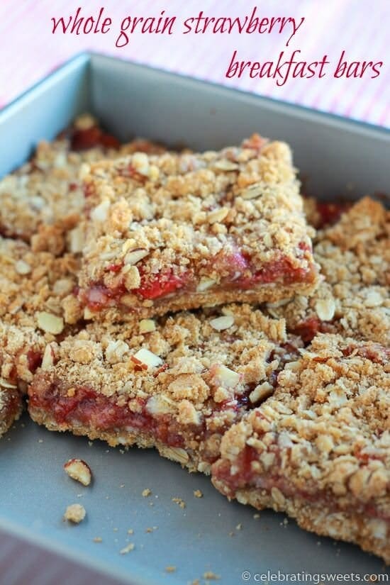 Whole Grain Strawberry Breakfast Bars ~ Delicious & Easy whole grain oat bars filled with strawberries and topped with an almond crumble! Perfect for Breakfast or a Sweet Treat!