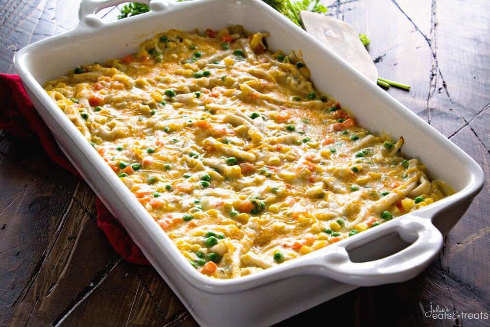 Cheesy Chicken and Noodle Casserole ~ Easy, Hearty and Comforting Casserole Loaded with Chicken, Peas, Carrots, Corn and Egg Noodles! This Will Become a Family Favorite Dinner!